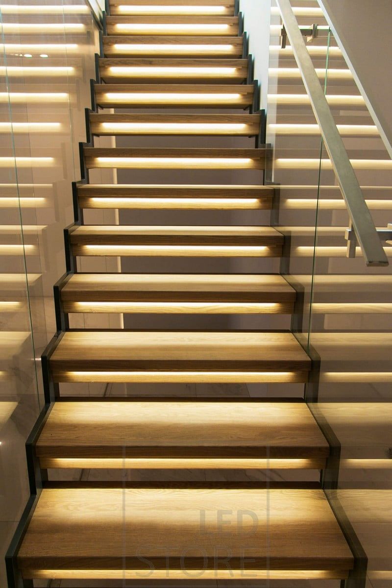 Stairs with led strips on the steps to illuminate the staircase atmospherically.